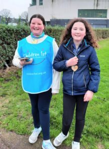 The trio was supported throughout the walk by Jessica's big sister Adelle, right, and her friend Jade McCallum.