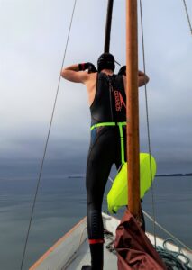 Matthew Bethell diving into the sea at Rhunahaorine Point.