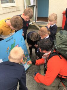 Chris showed the children his route on a map of the British Isles.