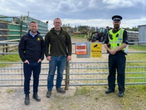 From left: NFU Mutual agent Chris Husthwaite, Andrew Glenn of Saddell Home Farm and Sergeant Jon Watson.